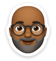 An emoji of a bald Black man.